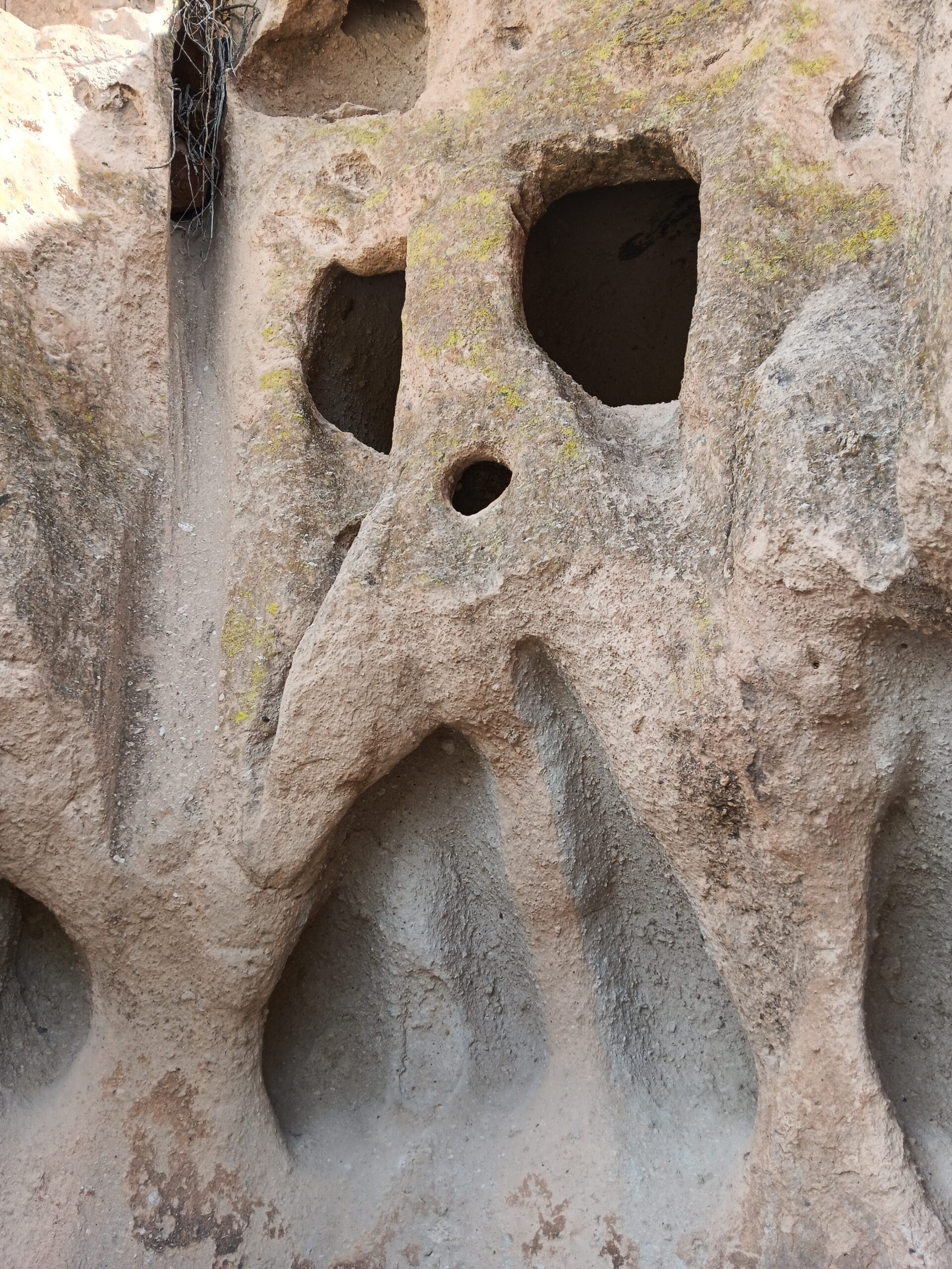 Cliff face with holes looking like a ghost face
